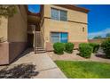 Condo complex featuring well-maintained grounds and private entrances via outdoor stairways at 2134 E Broadway Rd # 2030, Tempe, AZ 85282