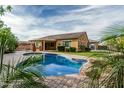 Backyard pool with built-in grill under covered patio at 2741 E Odessa St, Mesa, AZ 85213