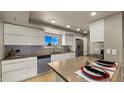 A pristine kitchen featuring ample storage, stainless steel appliances, and a neutral countertop at 3031 N Civic Center Plz # 355, Scottsdale, AZ 85251