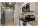 Sleek kitchen design featuring stainless steel appliances and modern hardware at 3031 N Civic Center Plz # 355, Scottsdale, AZ 85251