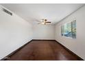 Spacious room with lots of natural light and a ceiling fan at 3814 E Poinsettia Dr, Phoenix, AZ 85028