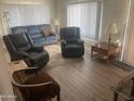 Comfortable living room with abundant natural light, and classic furniture at 4065 E University Dr # 155, Mesa, AZ 85205