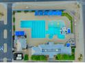 Aerial view of a community pool featuring recreational swimming and diving areas at 14267 W Crocus Dr, Surprise, AZ 85379