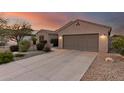 Lovely single-story home with a private driveway and a well-kept desert landscape for easy maintenance at 17562 W Desert Sage Dr, Goodyear, AZ 85338