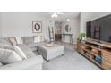 Cozy living room with comfortable seating, stylish decor, and access to other living spaces at 2444 S Noche De Paz --, Mesa, AZ 85202