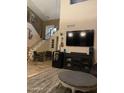 Spacious living room showcases a staircase, tile flooring, and ample natural light at 3845 E Yeager Dr, Gilbert, AZ 85295