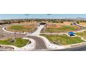 Aerial view of baseball fields, a recreational area for community sports and activities at 39985 W Sparks Ln, Maricopa, AZ 85138