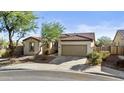 Charming single-Gathering home with well-maintained landscaping and a two-car garage at 29302 N 126Th Ln, Peoria, AZ 85383