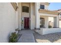 Charming front entrance with covered porch and desert landscaping at 1031 W Longhorn Dr, Chandler, AZ 85286
