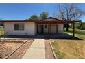 Well maintained ranch style home with a nice walkway and yard at 121 E Ivanhoe St, Gilbert, AZ 85295