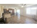 Bright, open layout with tile floors, connecting the kitchen, dining, and living areas, perfect for Gathering gatherings at 14620 N Yerba Buena Way # B, Fountain Hills, AZ 85268