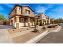 Charming neighborhood streetscape showcases well-maintained homes and desert landscaping at 34913 N 30Th Dr, Phoenix, AZ 85086