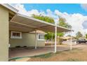 A single-story home with a carport at 3802 N 50Th Ave, Phoenix, AZ 85031