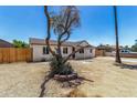 Charming single-story home featuring a well-maintained exterior and a spacious front yard at 3933 W Nancy Ln, Phoenix, AZ 85041