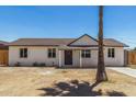 Charming single-story home featuring a well-maintained exterior and a spacious front yard at 3933 W Nancy Ln, Phoenix, AZ 85041