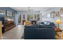 Cozy living room with fireplace, neutral paint and natural light at 17 W Vernon Ave # 31, Phoenix, AZ 85003