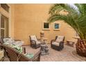 Private brick patio with ample seating perfect for relaxing in the desert sun at 25806 W Hilton Ave, Buckeye, AZ 85326