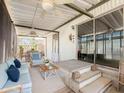 Inviting sunroom features comfortable seating, serene light, and a relaxing spa area for ultimate enjoyment at 2929 E Main St # 471, Mesa, AZ 85213