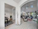 Open floor plan view into the expansive living room and gourmet kitchen at 3467 N Hooper St, Buckeye, AZ 85396