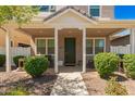 Inviting front porch offers a relaxing outdoor space with comfortable seating and lush landscaping at 3783 E Stiles Ln, Gilbert, AZ 85295