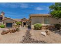 View of a single story home with desert landscaping at 3824 E Parkside Ln, Phoenix, AZ 85050