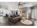 Living room and kitchen boast open plan and modern finishes, enhancing the space at 3935 E Rough Rider Rd # 1164, Phoenix, AZ 85050