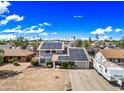 Lovely home featuring solar panels and RV parking at 4136 W Hearn Rd, Phoenix, AZ 85053