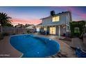 Inviting backyard pool with covered patio, perfect for outdoor entertaining at 4136 W Hearn Rd, Phoenix, AZ 85053