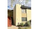 Two-story apartment building with modern architecture, updated windows, and desert landscaping at 4201 E Camelback Rd # 51, Phoenix, AZ 85018