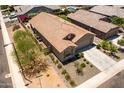 Desirable home featuring a tile roof, low-maintenance desert landscaping, and convenient two-car garage at 7648 S Thimble Peak --, Gold Canyon, AZ 85118