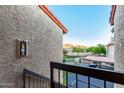 Balcony view overlooking the green space with mountain views at 10410 N Cave Creek Rd # 2030, Phoenix, AZ 85020