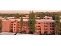 Beautiful exterior featuring well-maintained grounds and modern architecture with a flat roof at 12222 N Paradise Village S Pkwy # 442, Phoenix, AZ 85032