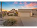 Inviting single-Gathering home featuring a tile roof, a two-car garage, and desert landscaping at 15232 S 36Th Pl, Phoenix, AZ 85044