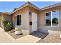 Inviting home entrance features a secure door, xeriscaping, and a stylish mailbox for added curb appeal at 1661 E Bishop Dr, Tempe, AZ 85282