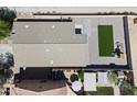 Aerial view of a well-maintained home showcasing a landscaped backyard at 23645 W Parkway Dr, Buckeye, AZ 85326