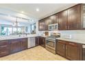Modern kitchen boasts ample cabinetry and stainless steel appliances at 277 E Kaibab Dr, Chandler, AZ 85249