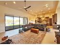 Spacious living room featuring high ceilings, open floor plan, and access to backyard at 4008 La Ultima Piedra --, Carefree, AZ 85377