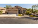 Inviting one-story home with manicured front yard, two-car garage, and desert landscaping at 4605 E Swilling Rd, Phoenix, AZ 85050