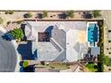Stunning bird's-eye view showcasing home's backyard pool, courtyard, and meticulous landscaping at 5212 S Seton Ct, Gilbert, AZ 85298