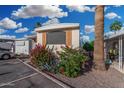 Well-maintained single-story home with manicured desert landscaping and a charming exterior at 730 S Country Club Dr # Ofc, Mesa, AZ 85210