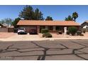 Inviting single-story home with manicured landscaping and a convenient driveway at 1156 E Vinedo Ln, Tempe, AZ 85284