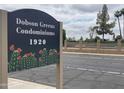Dobson Greens Condominiums with cacti and sign with year 1920 at 1920 W Lindner Ave # 222, Mesa, AZ 85202