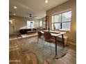 Open-concept living and dining area filled with natural light and contemporary furnishings at 2246 E Yale St, Phoenix, AZ 85006