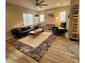 Inviting living room with modern decor, featuring stylish seating, area rugs, and ample natural light at 2246 E Yale St, Phoenix, AZ 85006