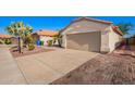 Charming single-story home featuring a two-car garage and low-maintenance desert landscaping at 4515 E Verbena Dr, Phoenix, AZ 85044