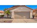 Charming single-story home featuring a two-car garage and low-maintenance desert landscaping at 4515 E Verbena Dr, Phoenix, AZ 85044
