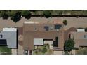 Bird's-eye view of the roof, highlighting the solar panels and air conditioning units at 10236 N 105Th Dr, Sun City, AZ 85351