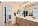 Inviting bathroom with double vanity, ample storage space, modern fixtures and a glass enclosed walk-in shower at 17349 E Quail Ridge Dr, Fountain Hills, AZ 85268