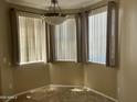 Sunny dining area with large windows and neutral decor at 1941 S Pierpont Dr # 1014, Mesa, AZ 85206
