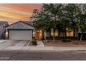 Charming single-story home with a two-car garage and well-manicured landscaping at 2330 E Stephens Pl, Chandler, AZ 85225